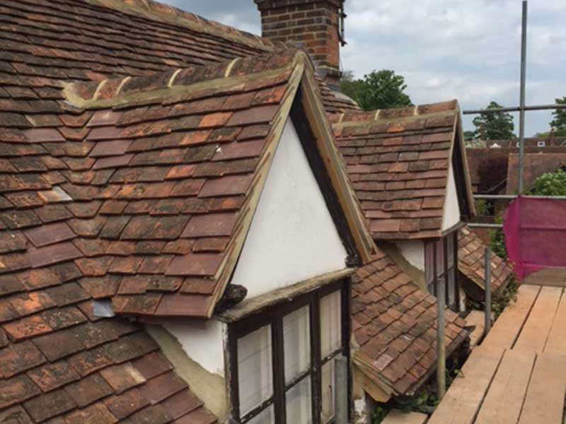 New roof using reclaimed tiles in knebworth