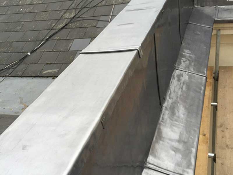 Lead roof parapet repair